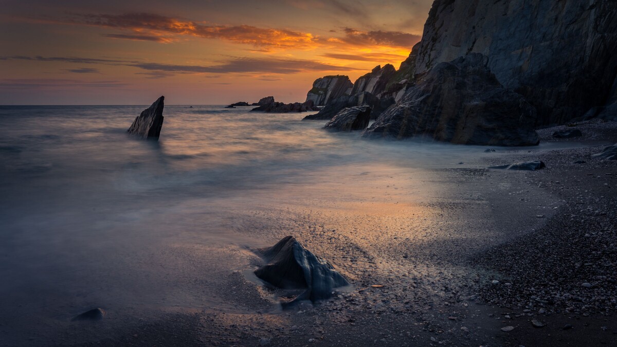 海岸日落岩石